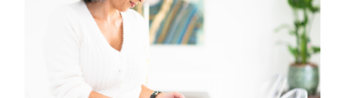 woman reading information from her phone